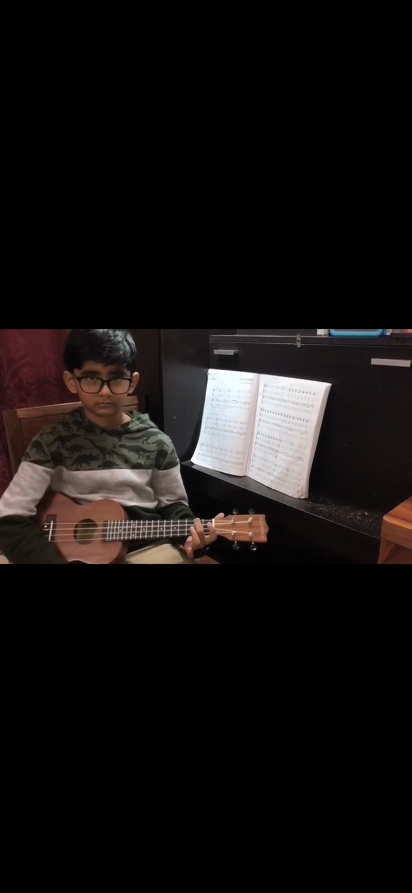 Our young student plays the Ukulele. Guitar,Piano ,Singing online classes and courses