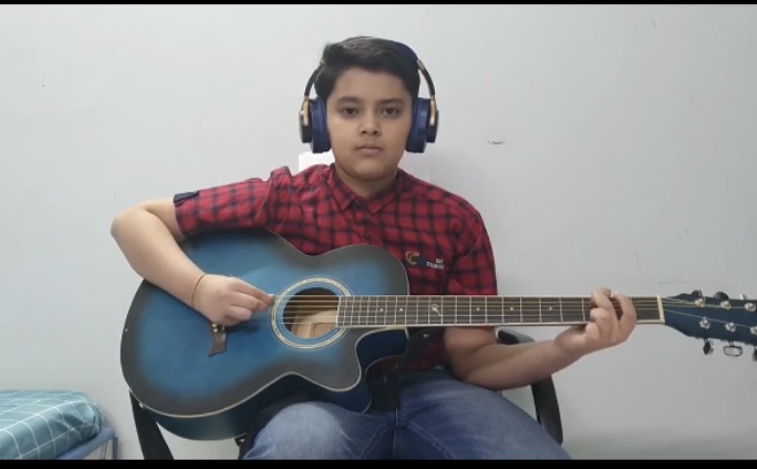 Our Student is learning Guitar with us through online classes